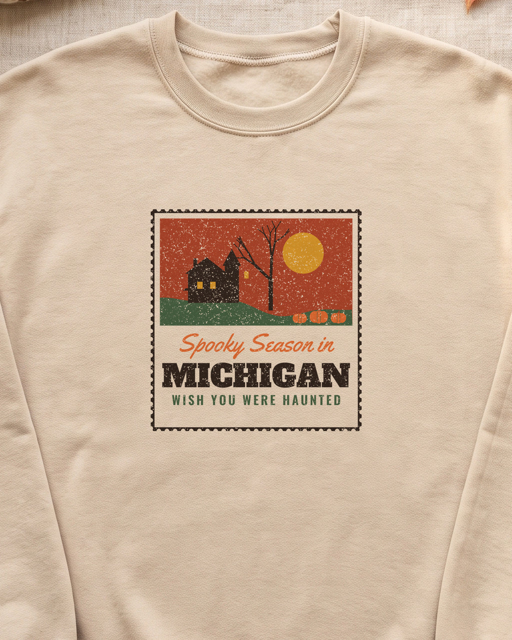 Spooky Season in Michigan Haunted Postcard Crewneck Sweatshirt (close-up)