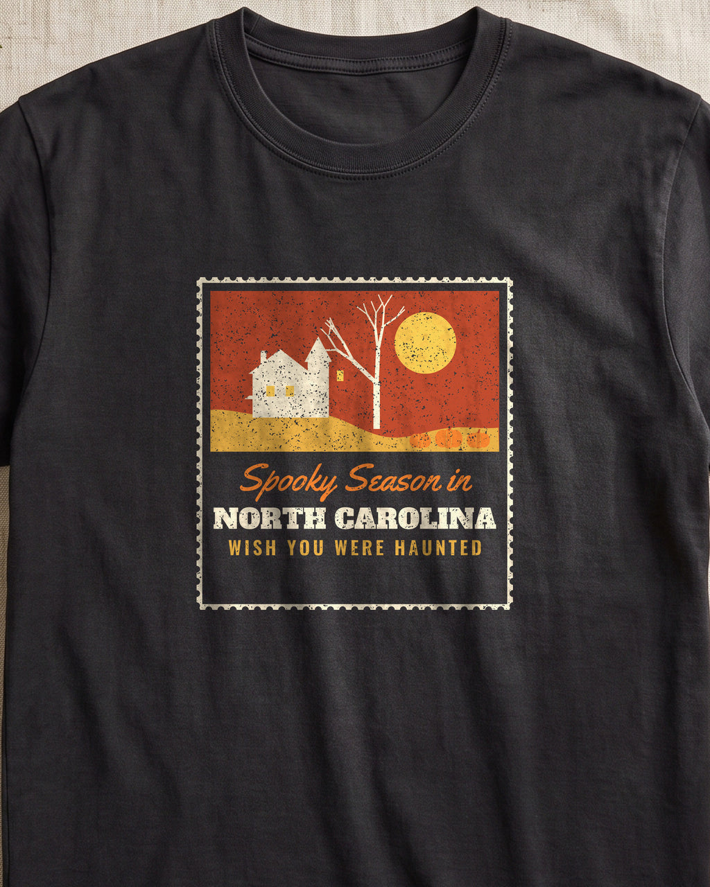 Spooky Season in North Carolina Haunted Postcard T-Shirt (close-up)