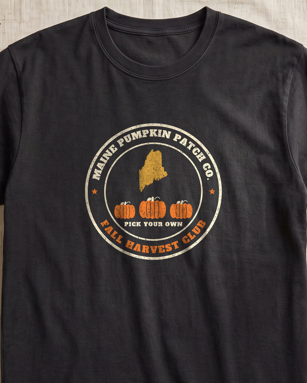 Maine Pumpkin Patch Co. Badge T-Shirt (close-up)