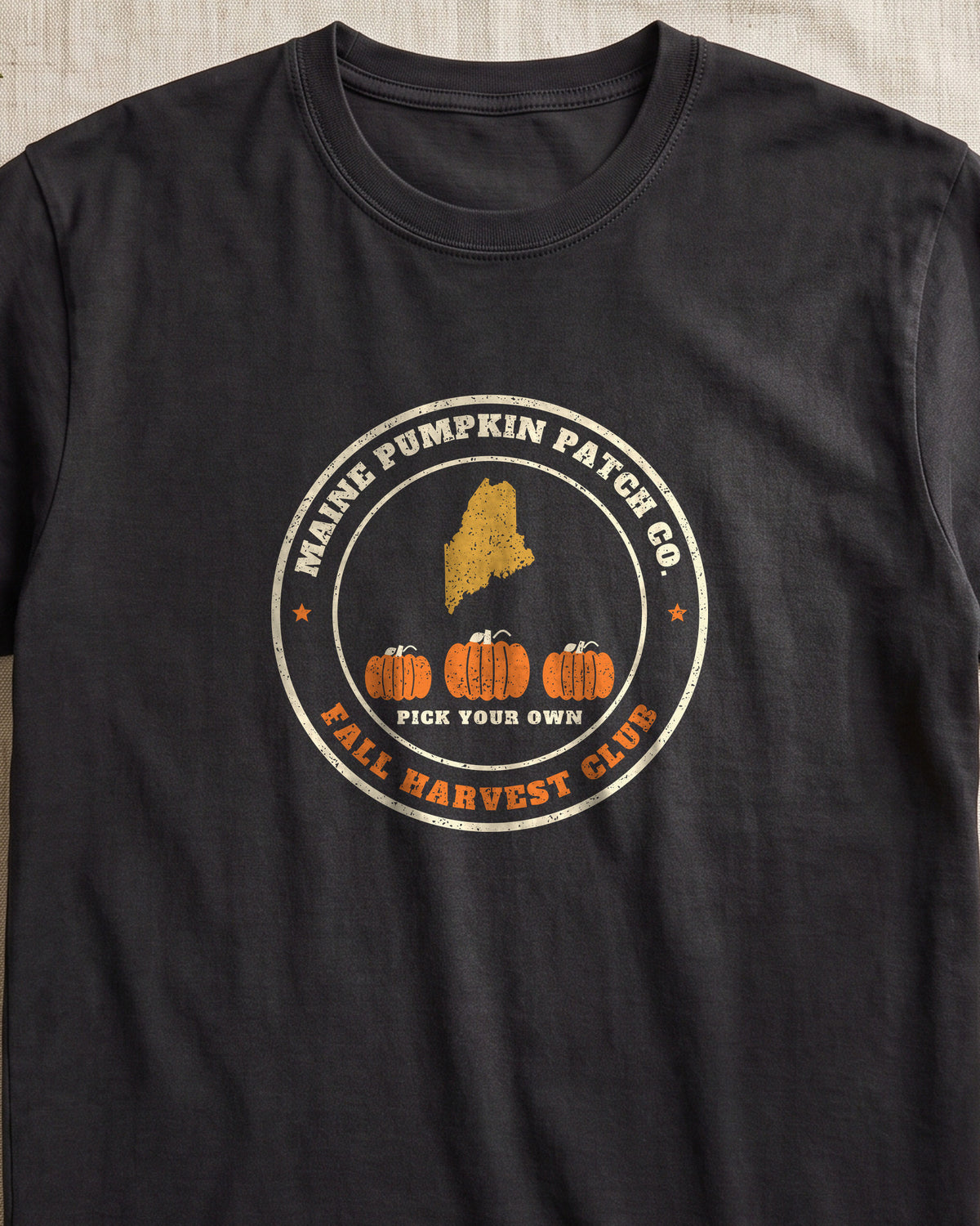 Maine Pumpkin Patch Co. Badge T-Shirt (close-up)