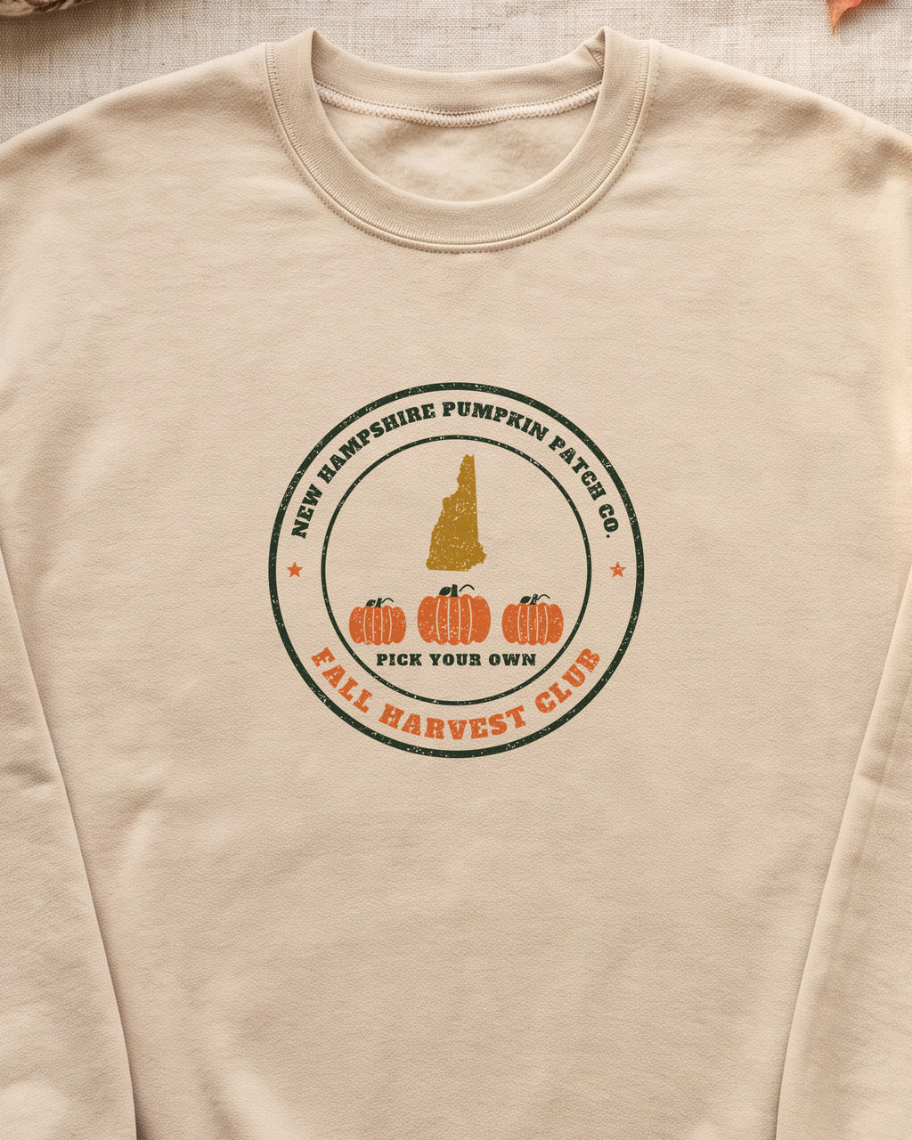 New Hampshire Pumpkin Patch Co. Badge Crewneck Sweatshirt (close-up)