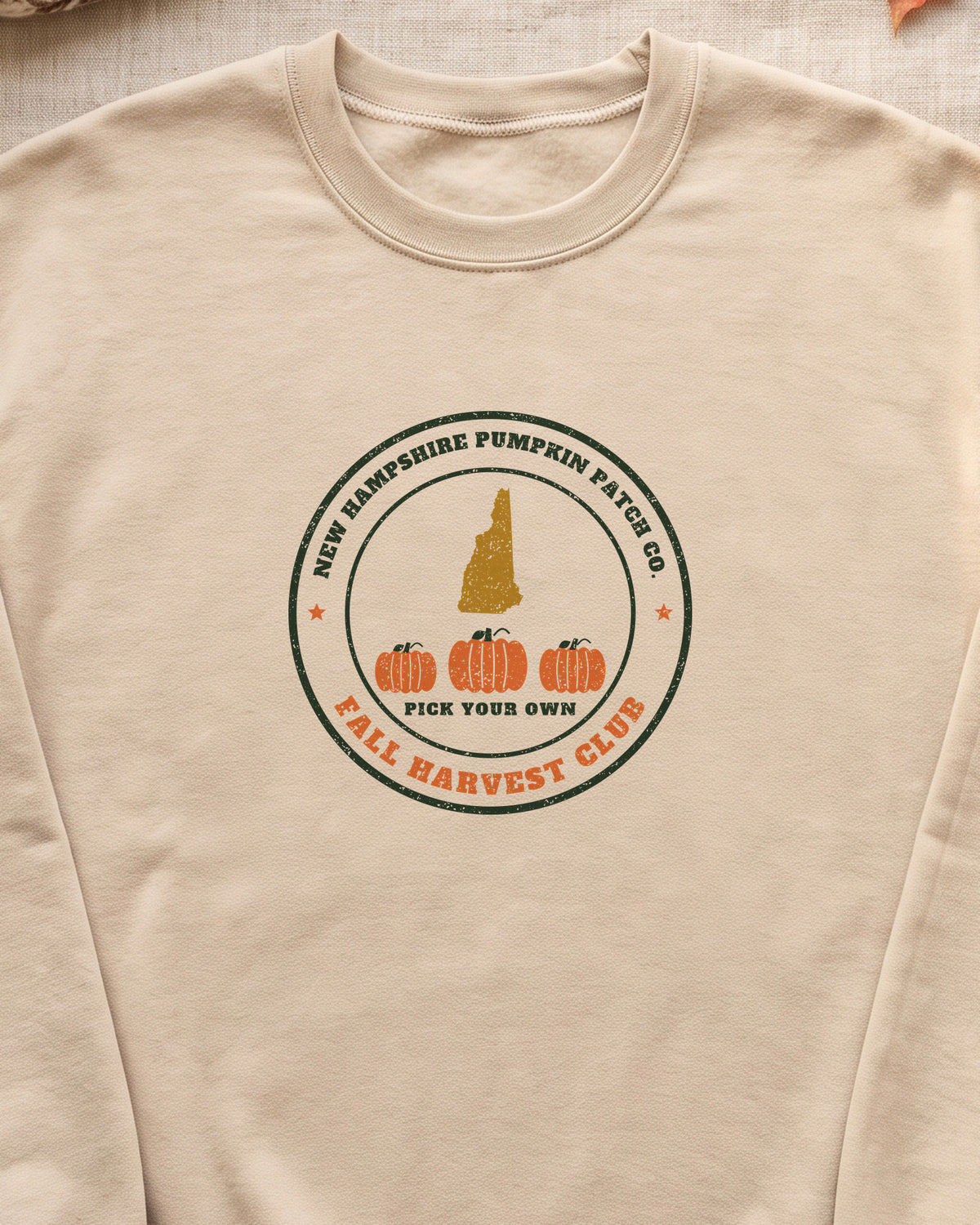 New Hampshire Pumpkin Patch Co. Badge Crewneck Sweatshirt (close-up)