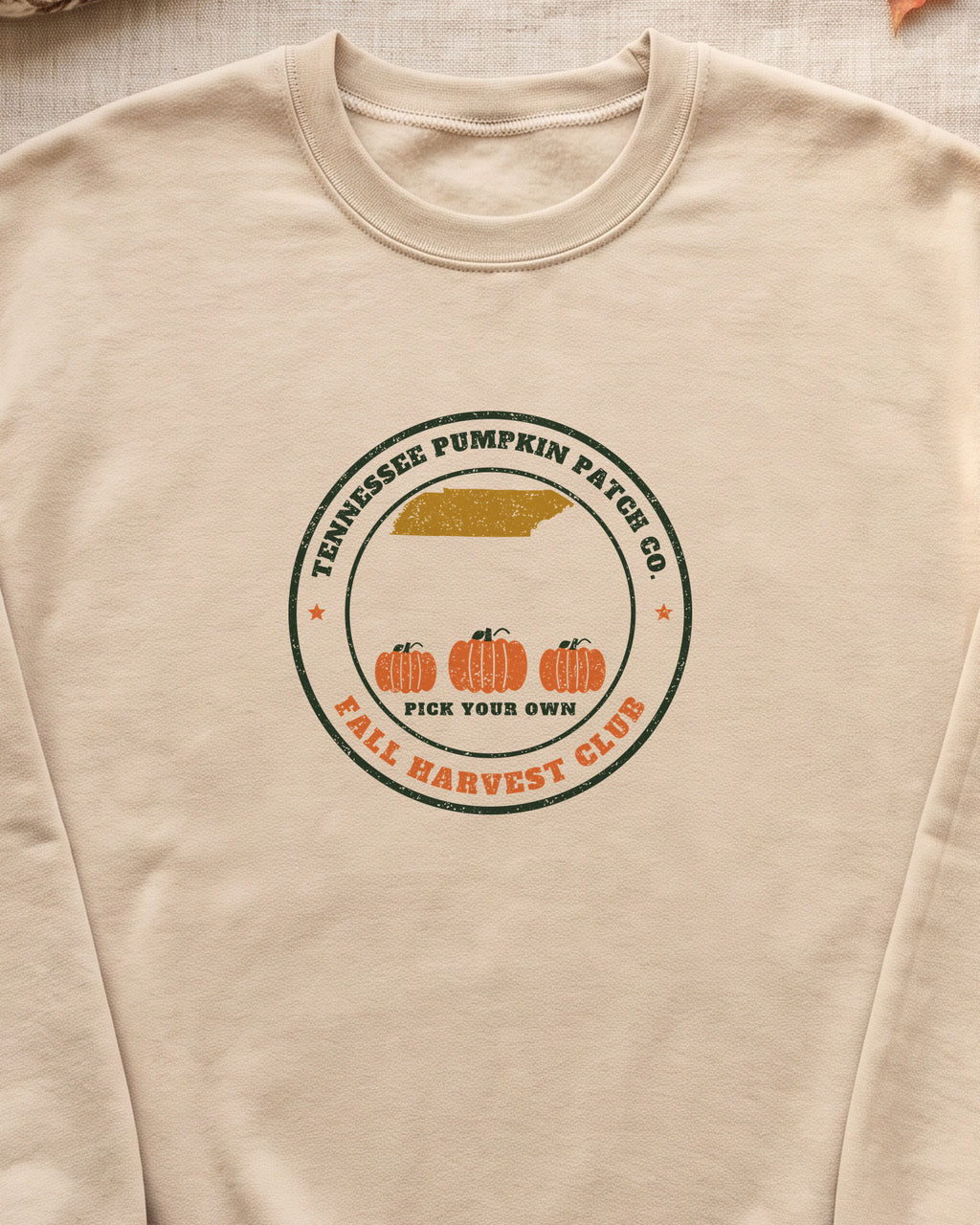 Tennessee Pumpkin Patch Co. Badge Crewneck Sweatshirt (close-up)