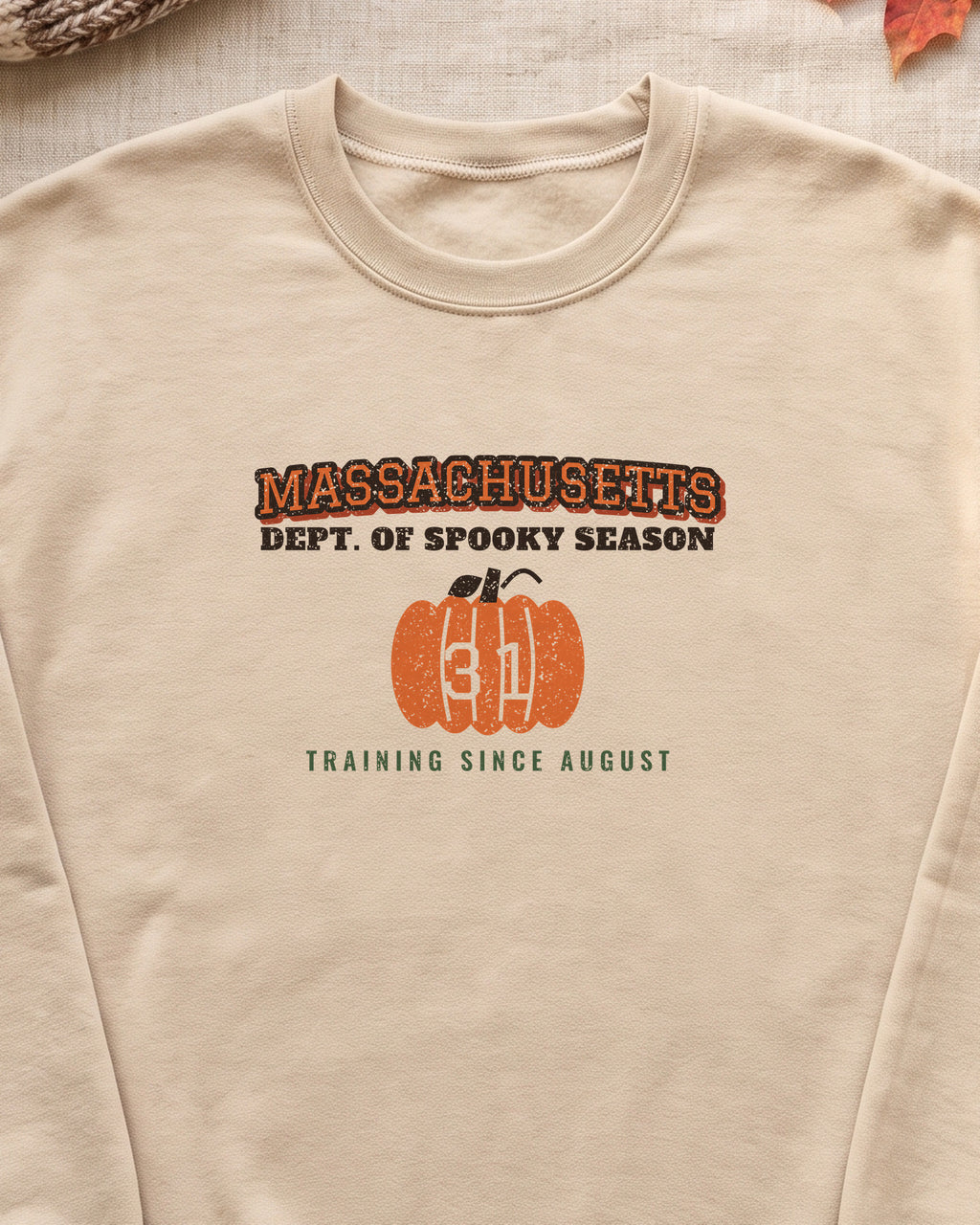Massachusetts Dept. of Spooky Season Varsity Crewneck Sweatshirt (close-up)