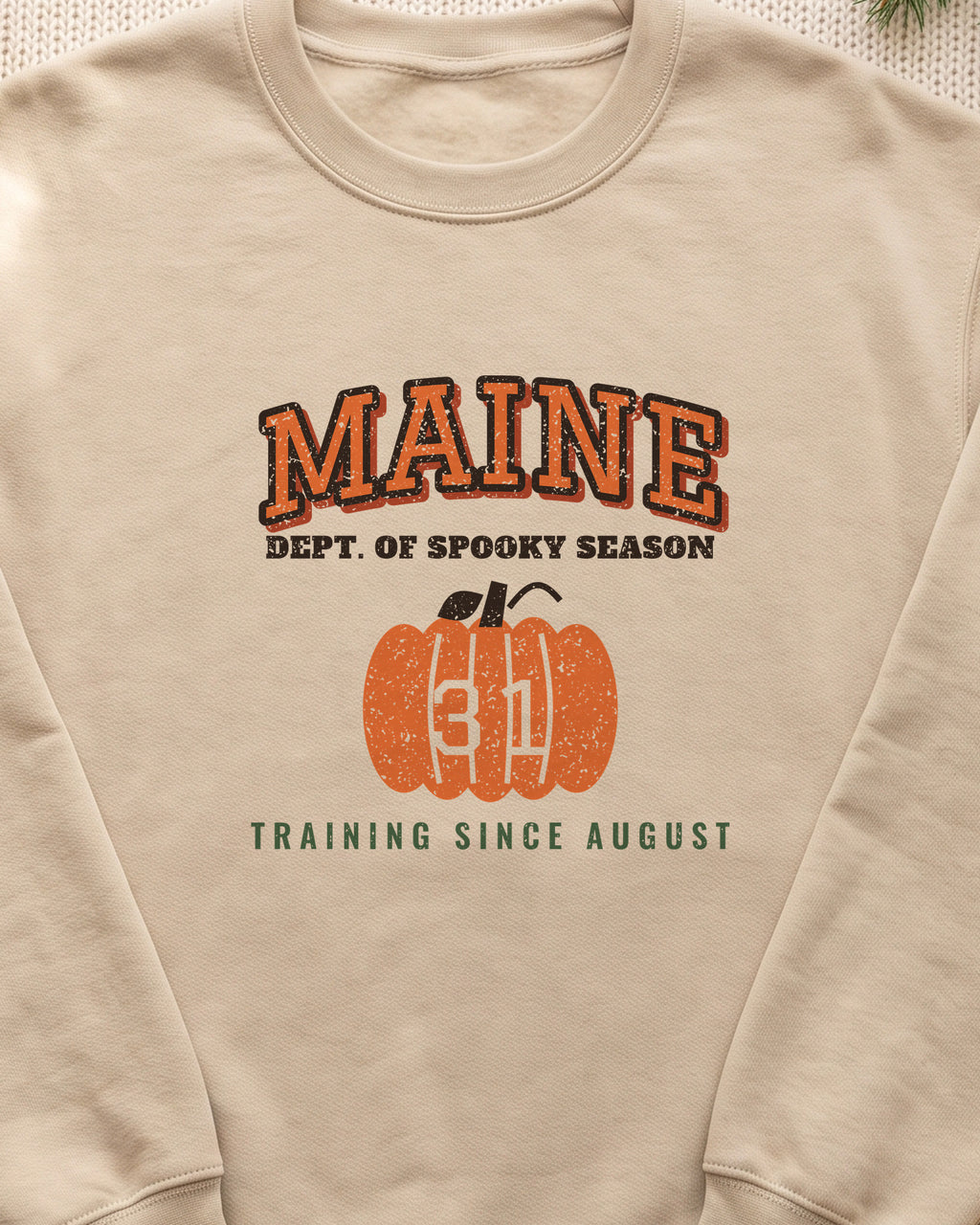 Maine Dept. of Spooky Season Varsity Crewneck Sweatshirt (close-up)