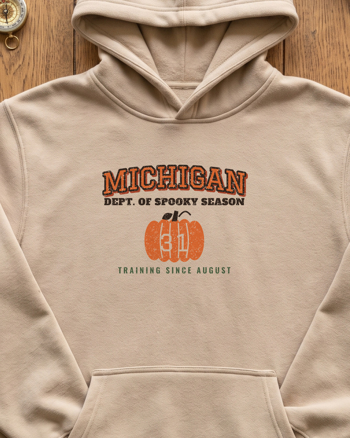 Michigan Dept. of Spooky Season Varsity Hoodie (close-up)
