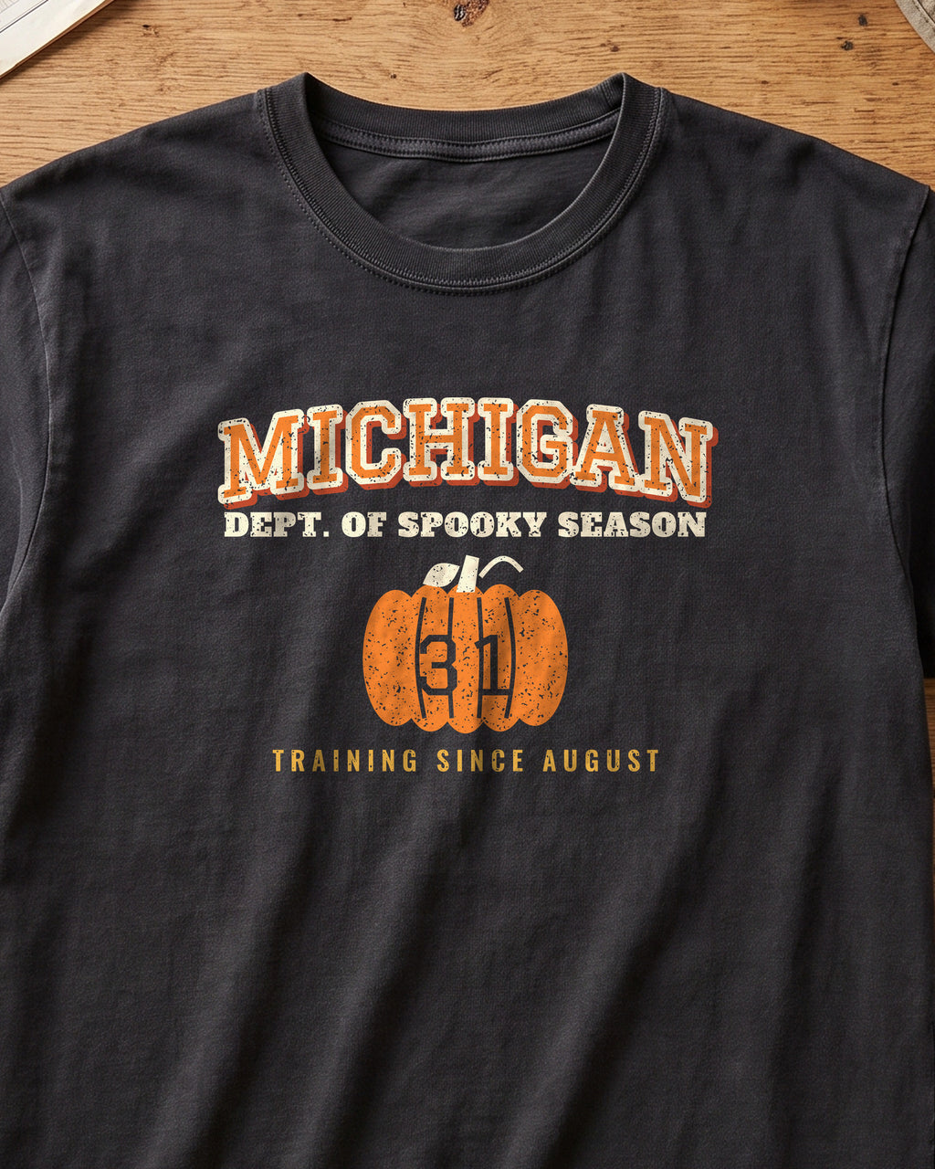 Michigan Dept. of Spooky Season Varsity T-Shirt (close-up)
