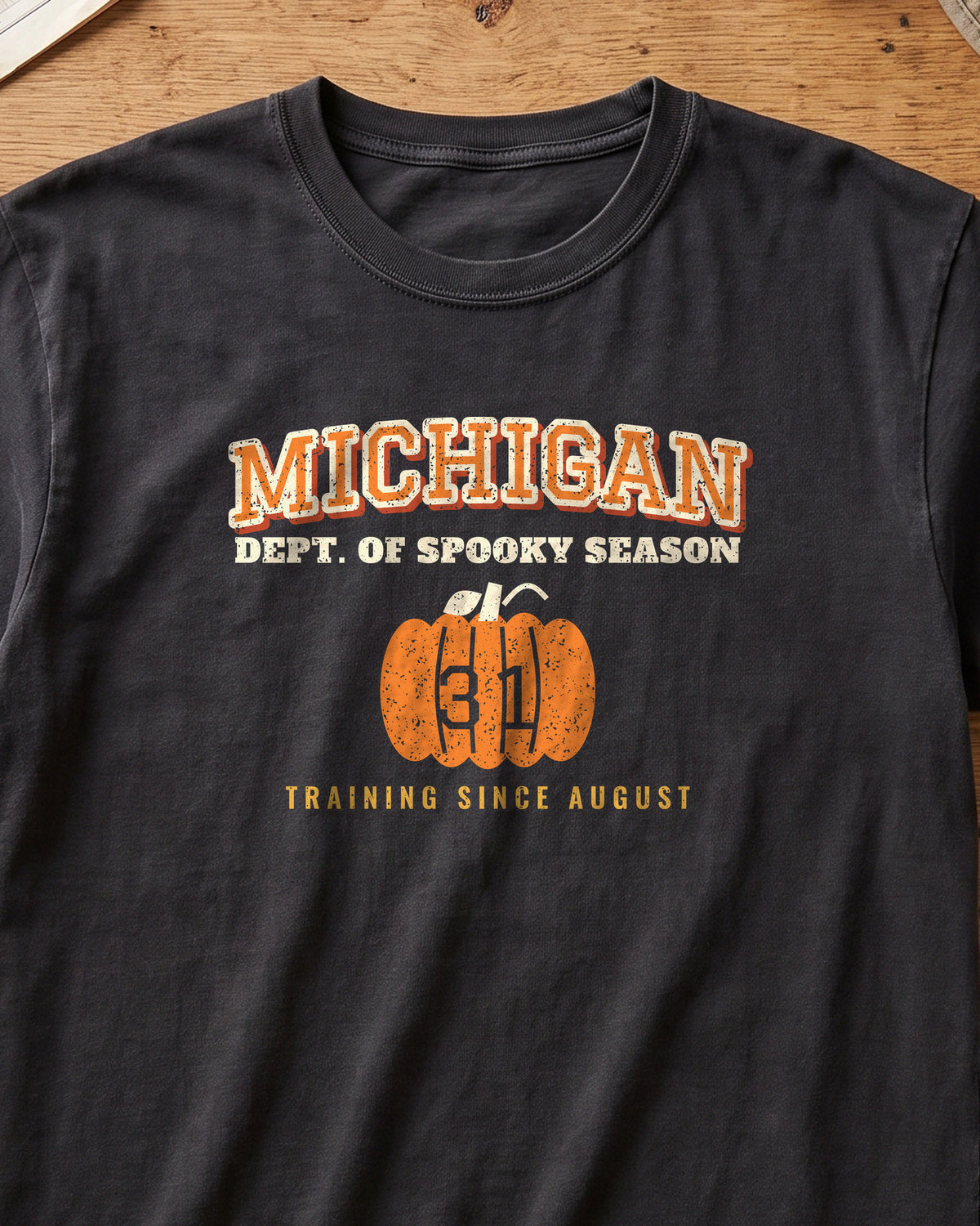 Michigan Dept. of Spooky Season Varsity T-Shirt (close-up)