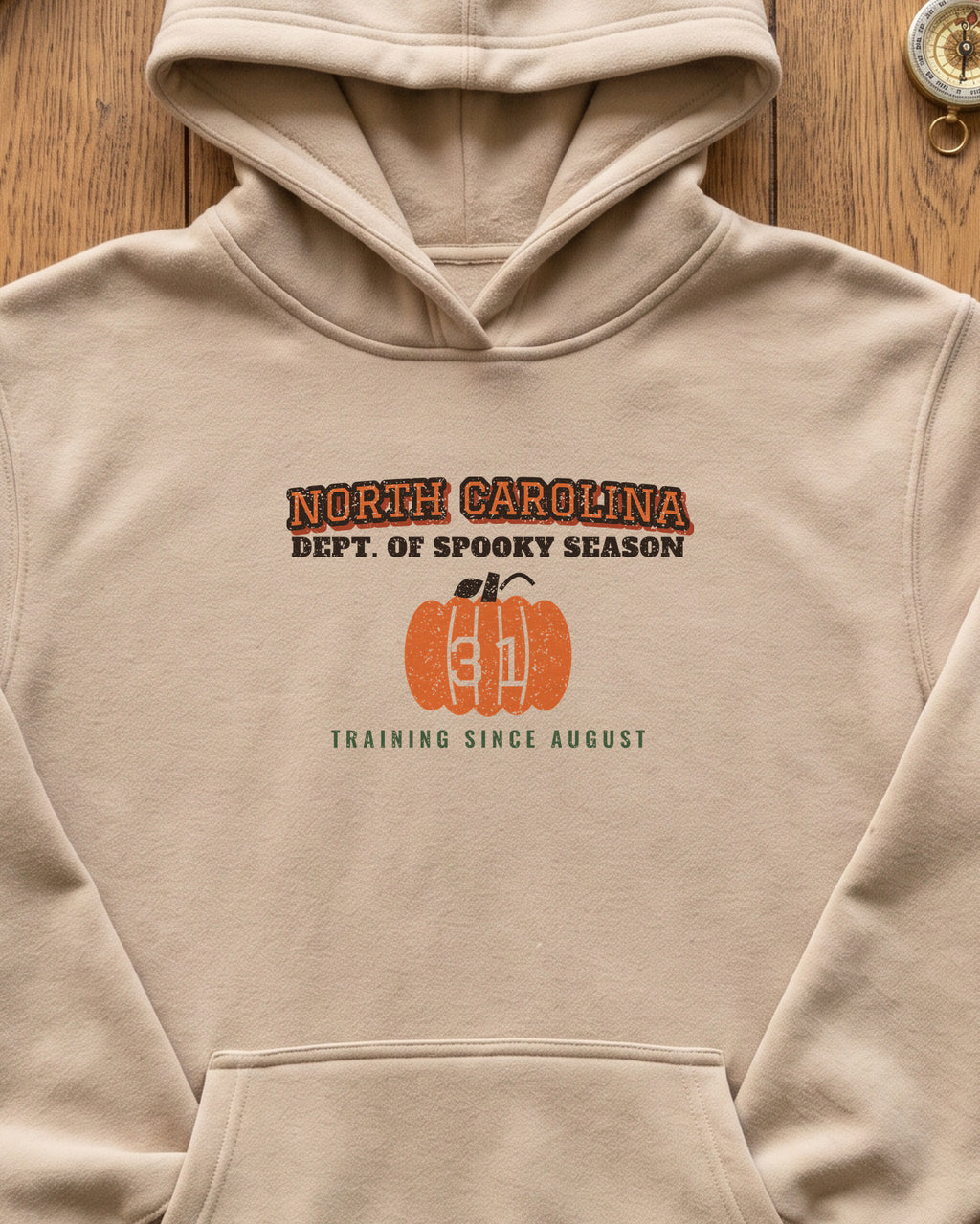North Carolina Dept. of Spooky Season Varsity Hoodie (close-up)