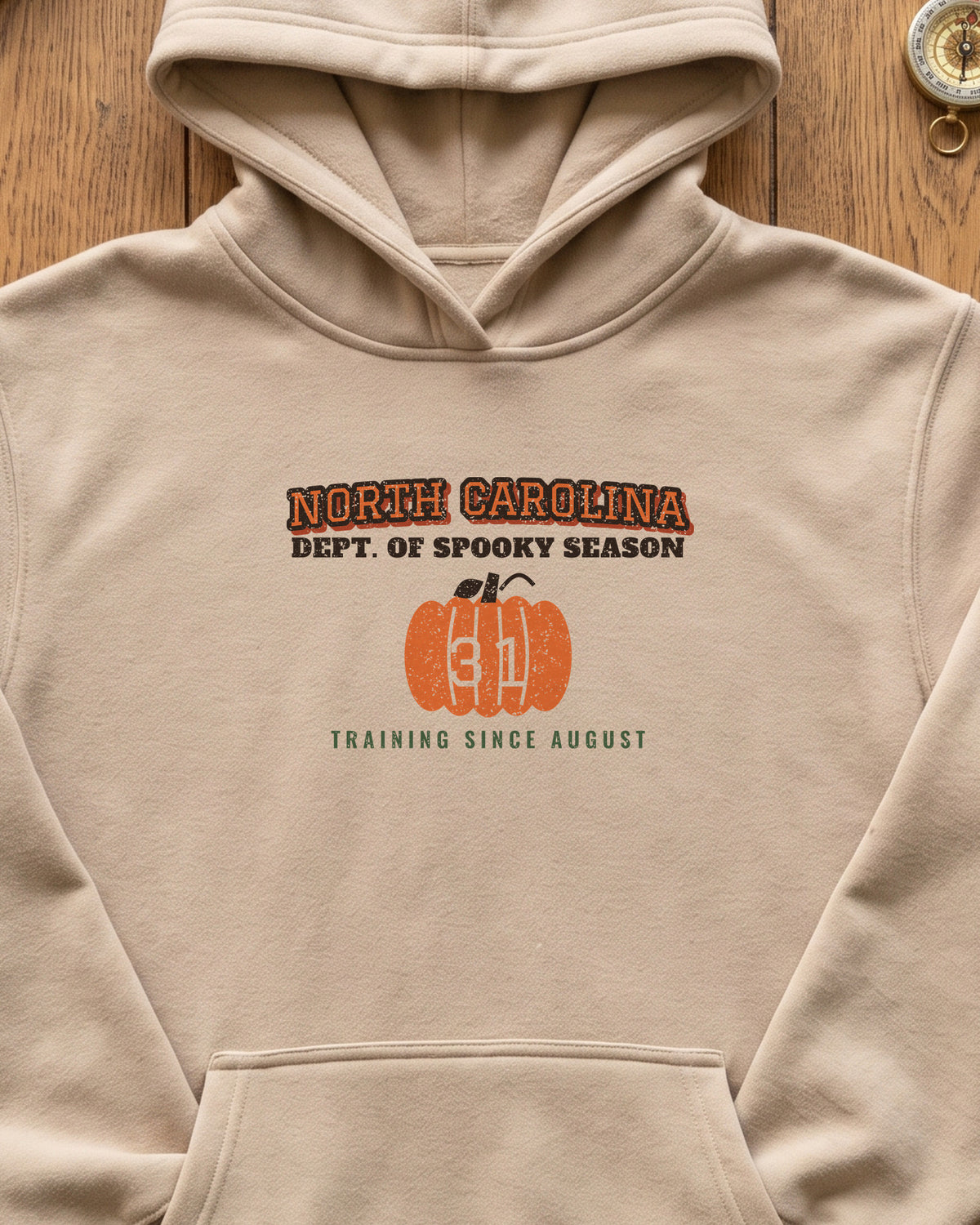 North Carolina Dept. of Spooky Season Varsity Hoodie (close-up)