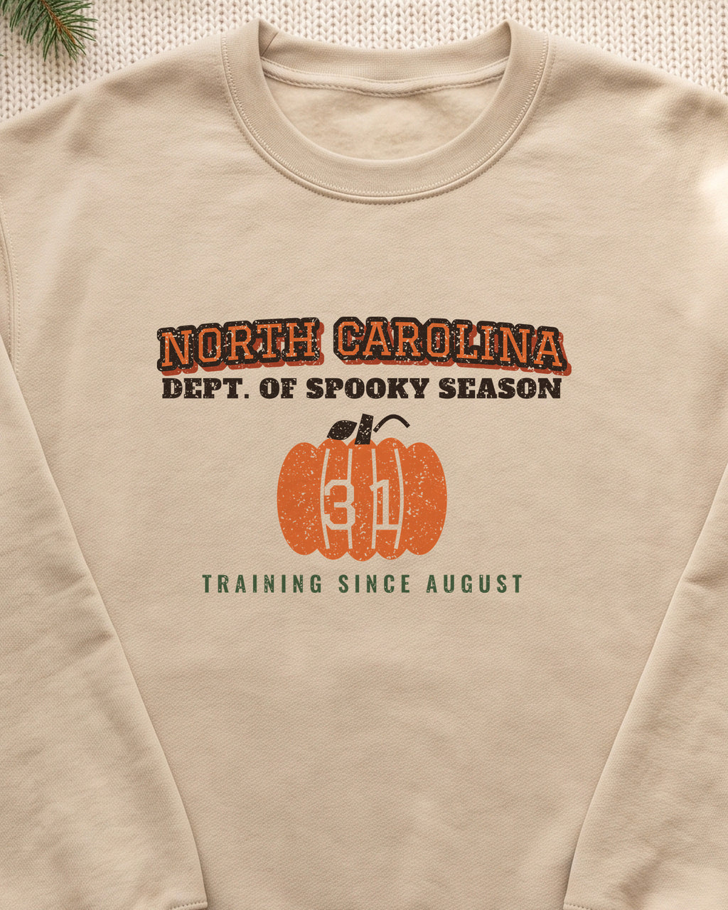 North Carolina Dept. of Spooky Season Varsity Crewneck Sweatshirt (close-up)