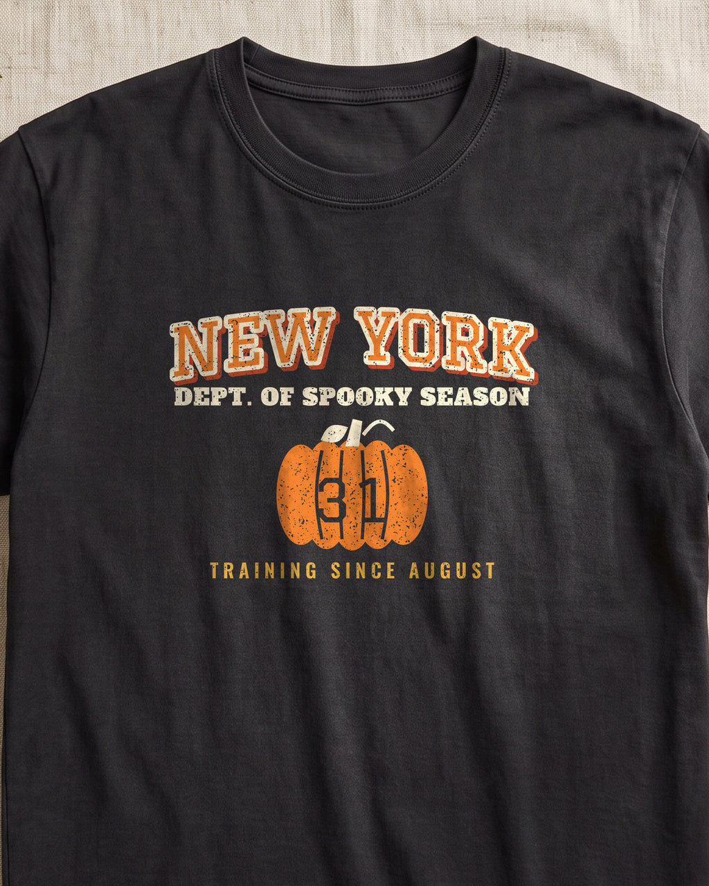 New York Dept. of Spooky Season Varsity T-Shirt (close-up)