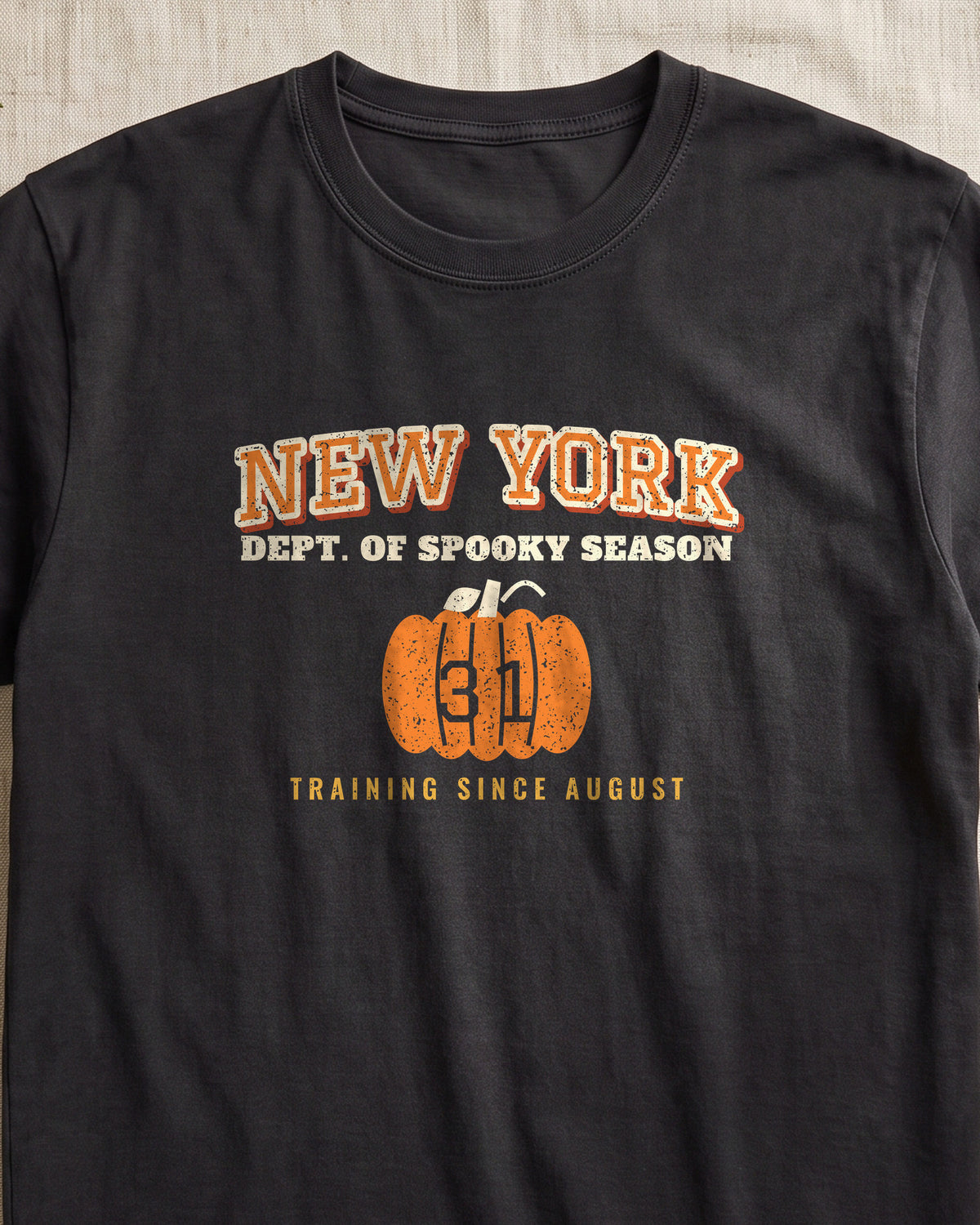 New York Dept. of Spooky Season Varsity T-Shirt (close-up)