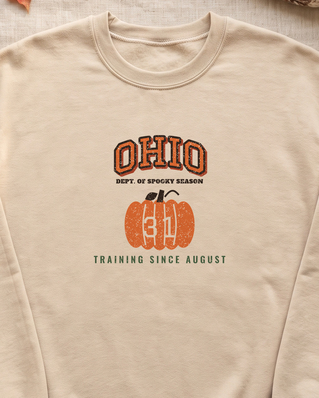 Ohio Dept. of Spooky Season Varsity Crewneck Sweatshirt (close-up)