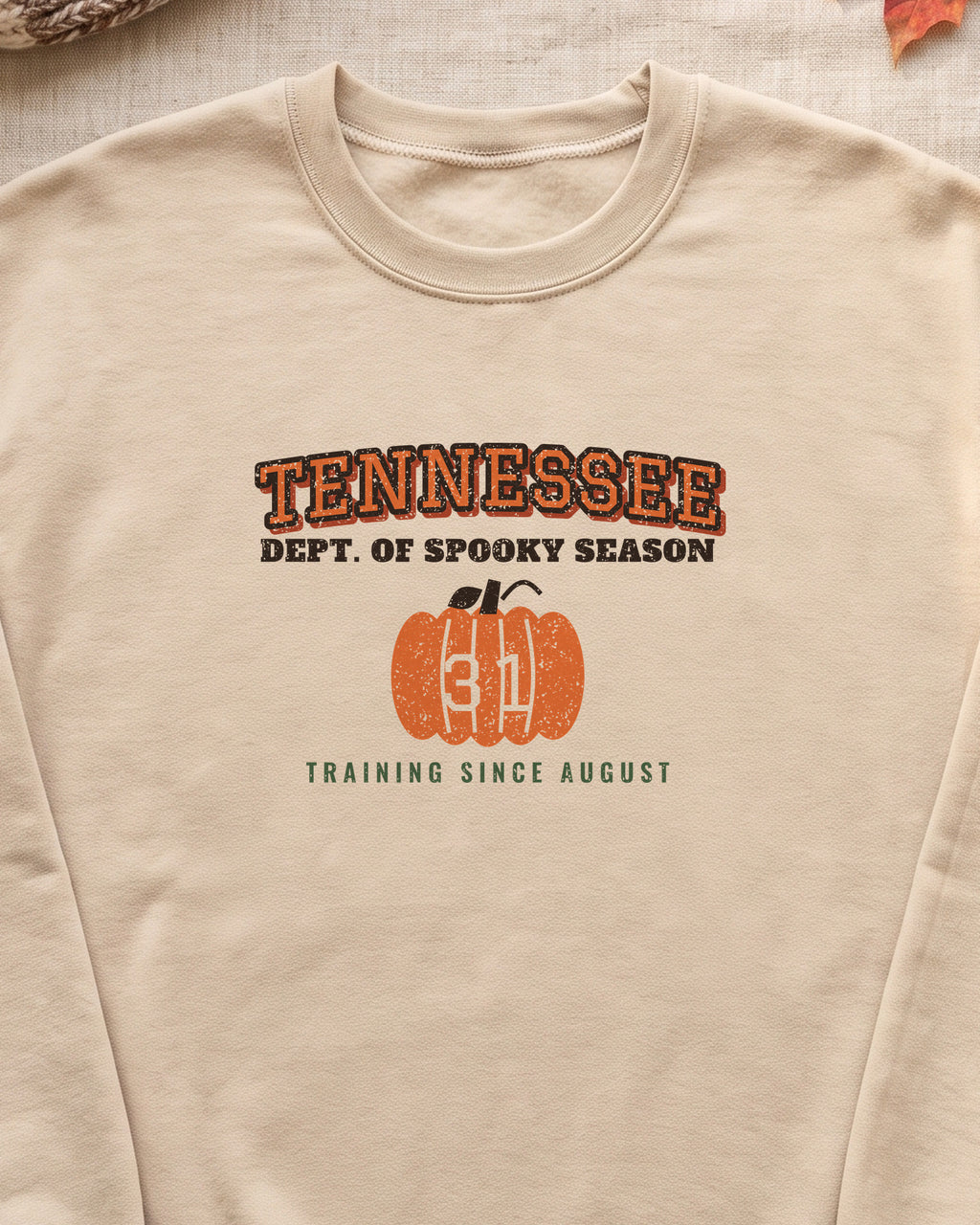 Tennessee Dept. of Spooky Season Varsity Crewneck Sweatshirt (close-up)