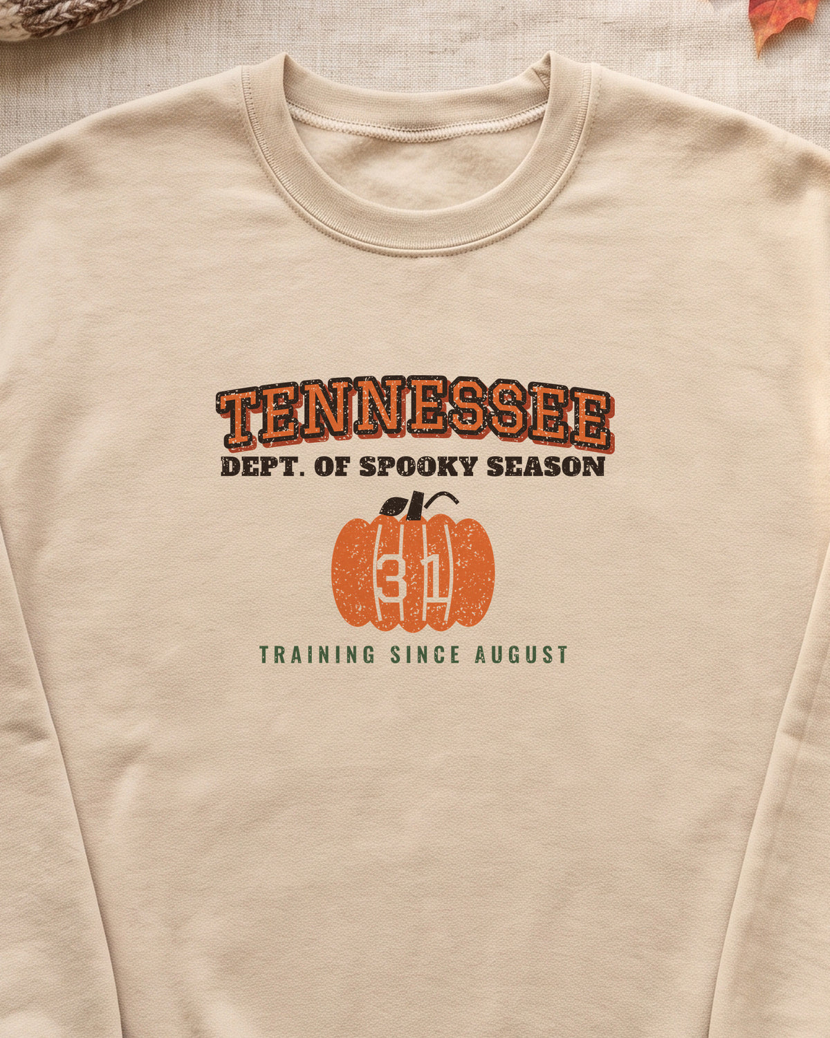 Tennessee Dept. of Spooky Season Varsity Crewneck Sweatshirt (close-up)