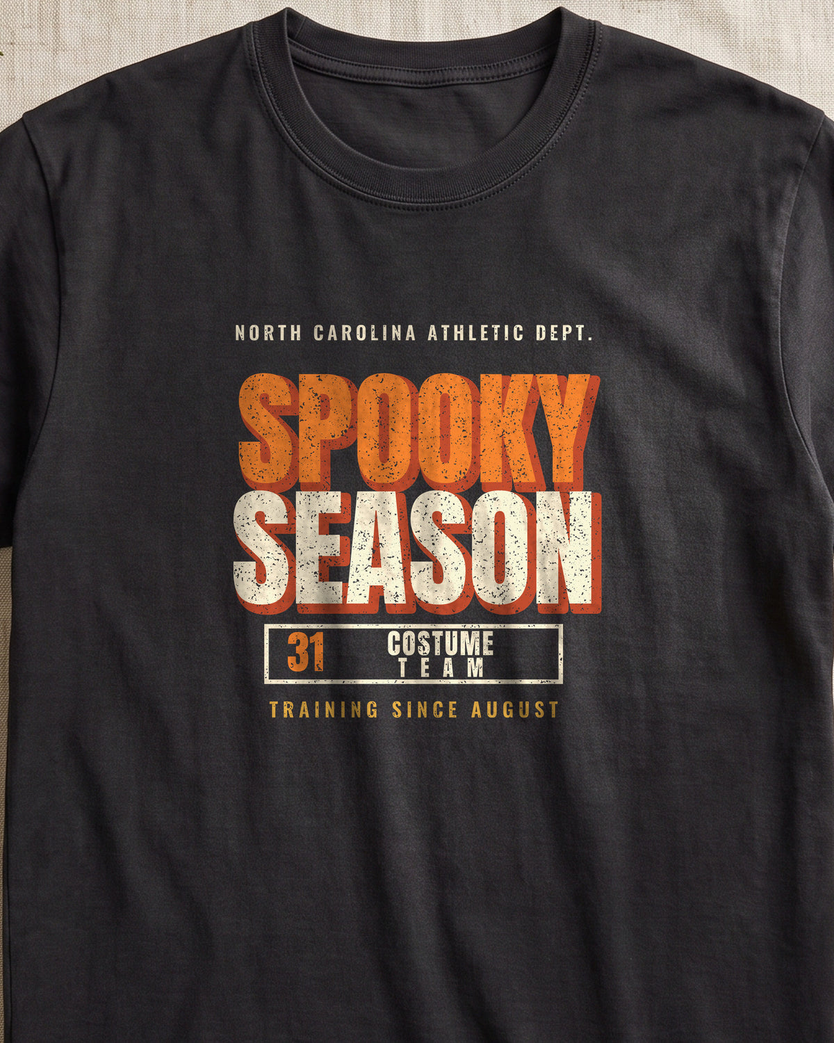 North Carolina Spooky Season Athletic Dept. T-Shirt (close-up)