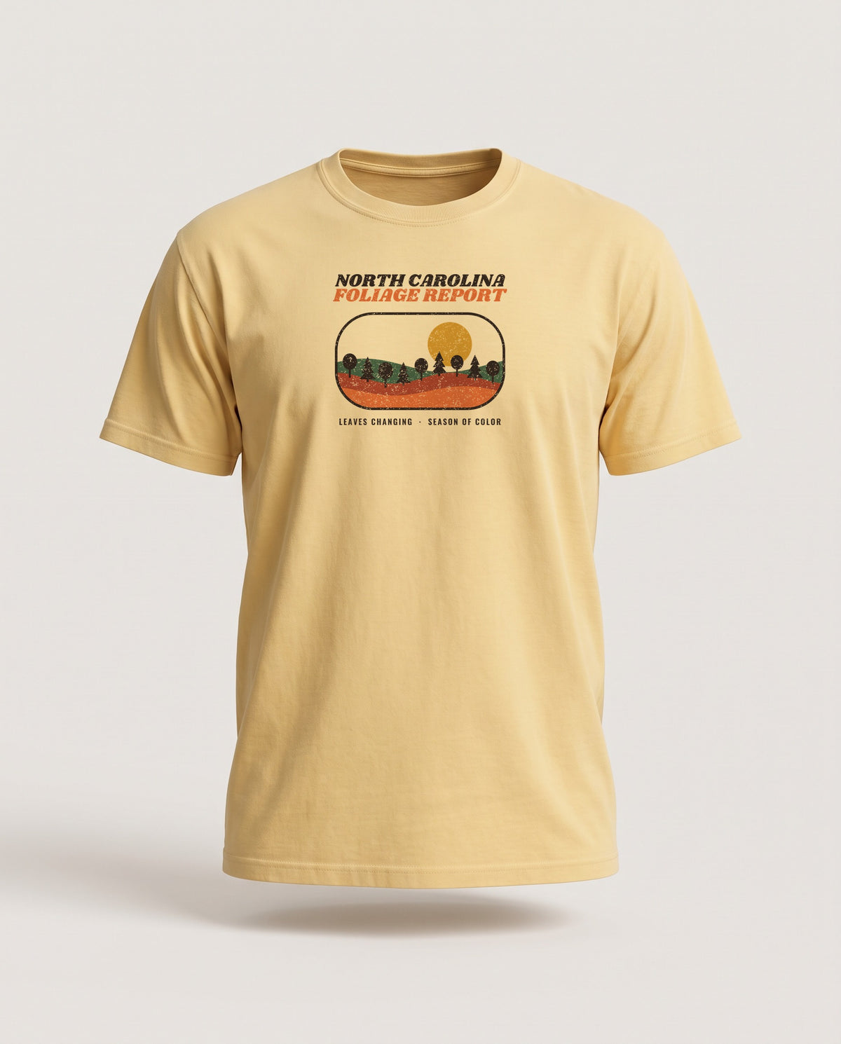 North Carolina Foliage Report Retro Landscape T-Shirt — Butter (mockup)