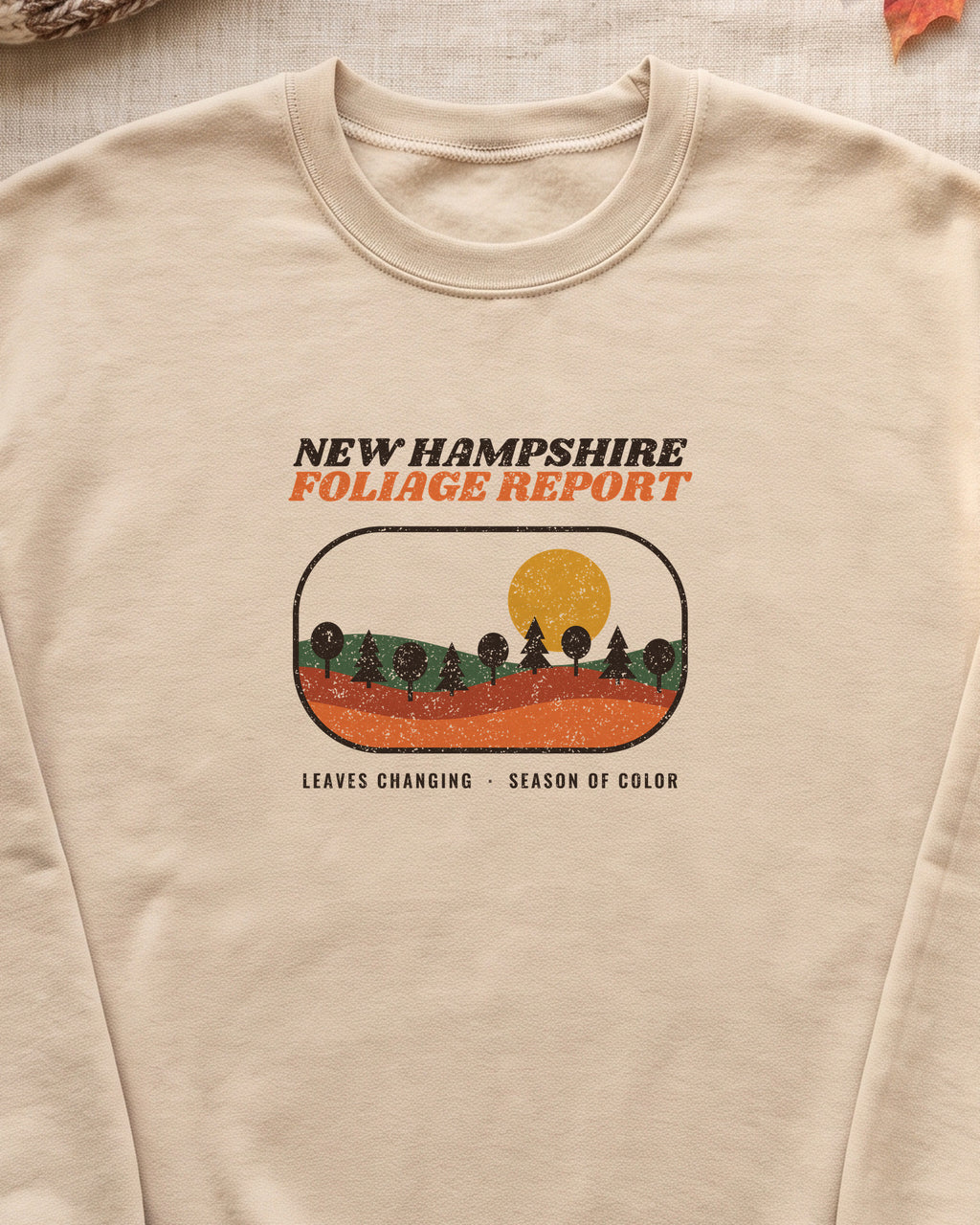New Hampshire Foliage Report Retro Landscape Crewneck Sweatshirt (close-up)