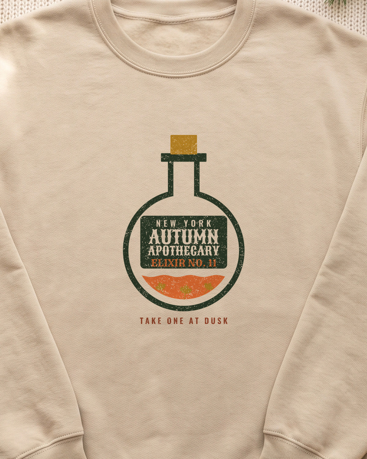 New York Autumn Apothecary Flask Crewneck Sweatshirt (close-up)