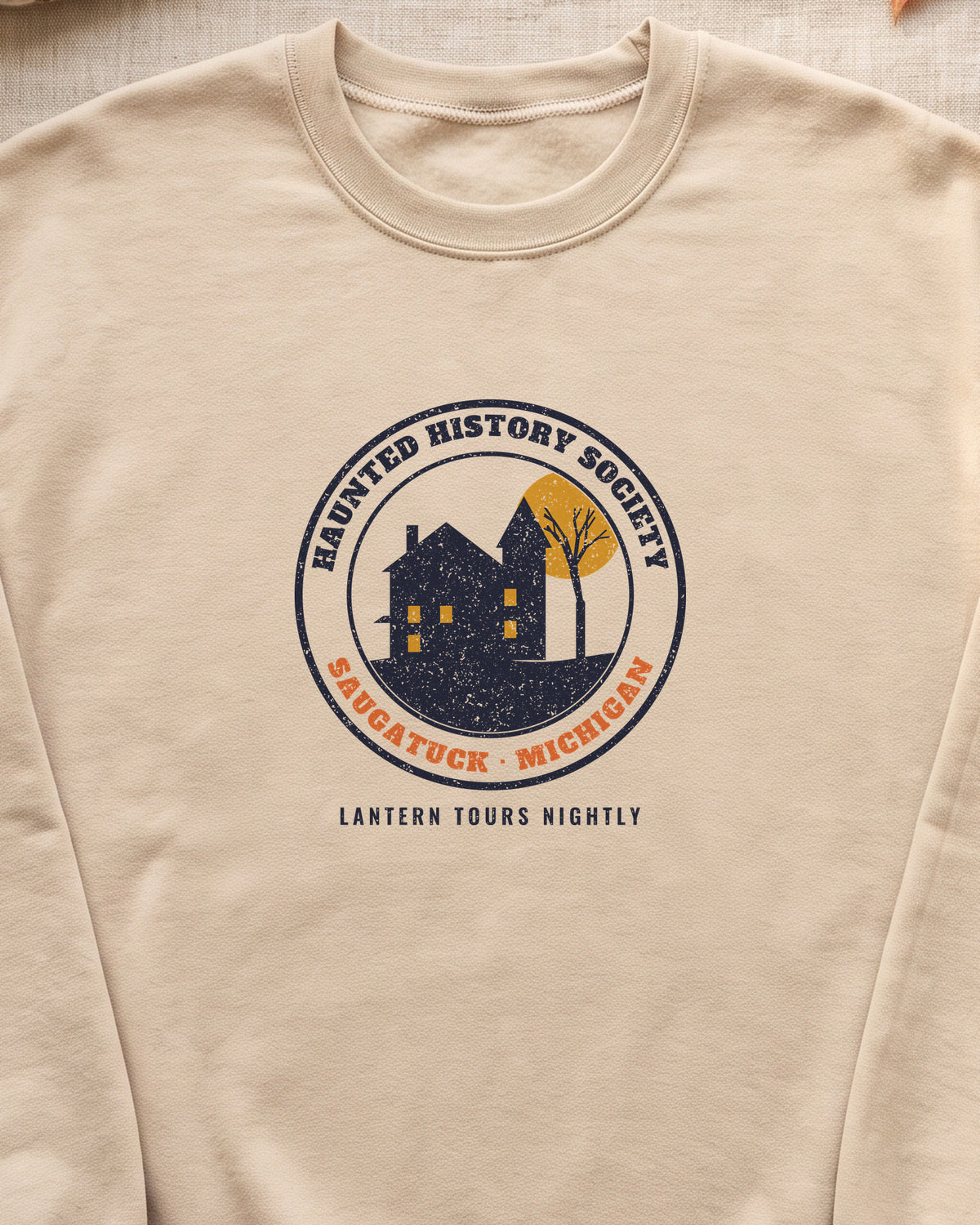 Saugatuck Michigan Haunted History Society Seal Crewneck Sweatshirt (close-up)
