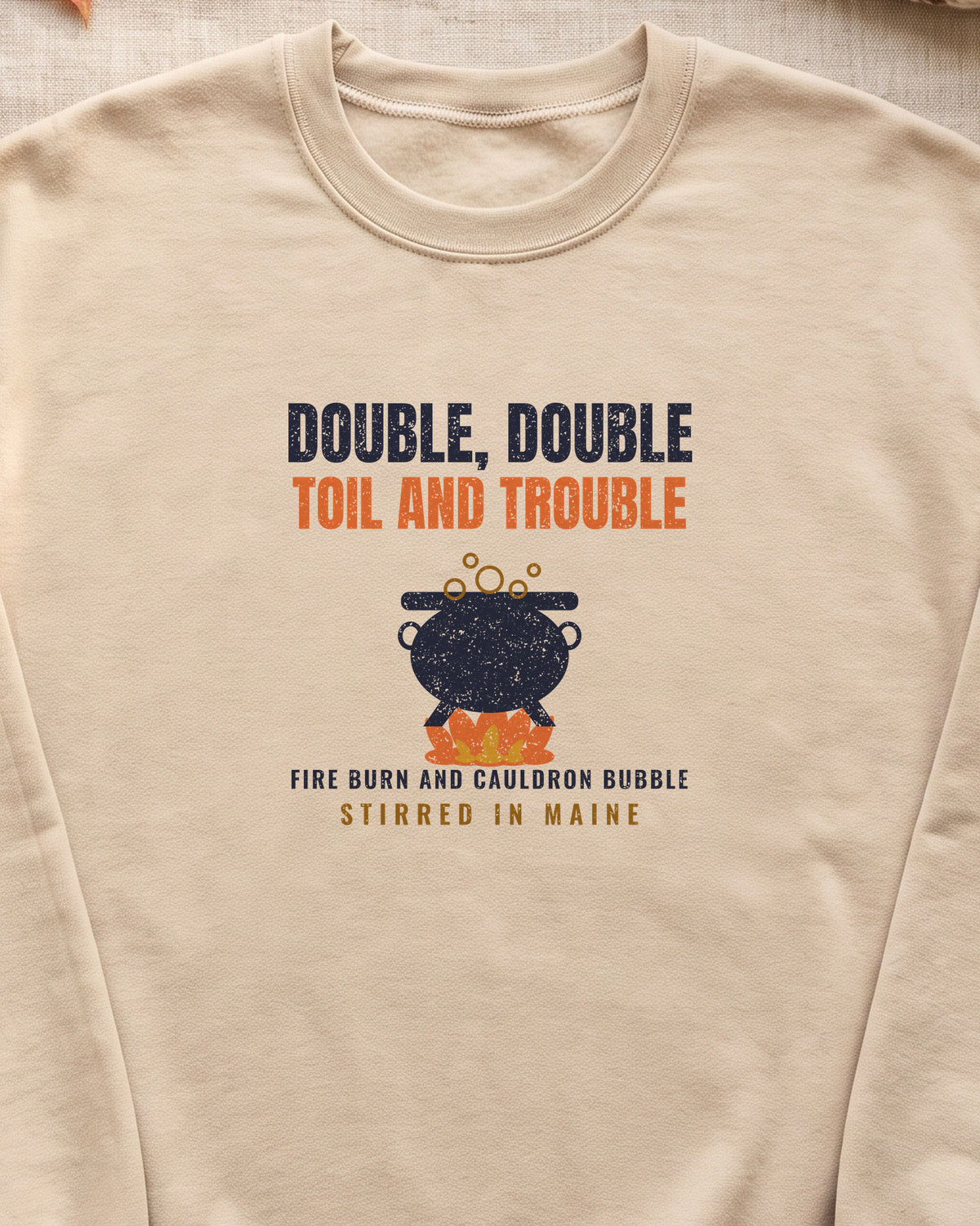 Double Double Toil and Trouble Maine Crewneck Sweatshirt (close-up)