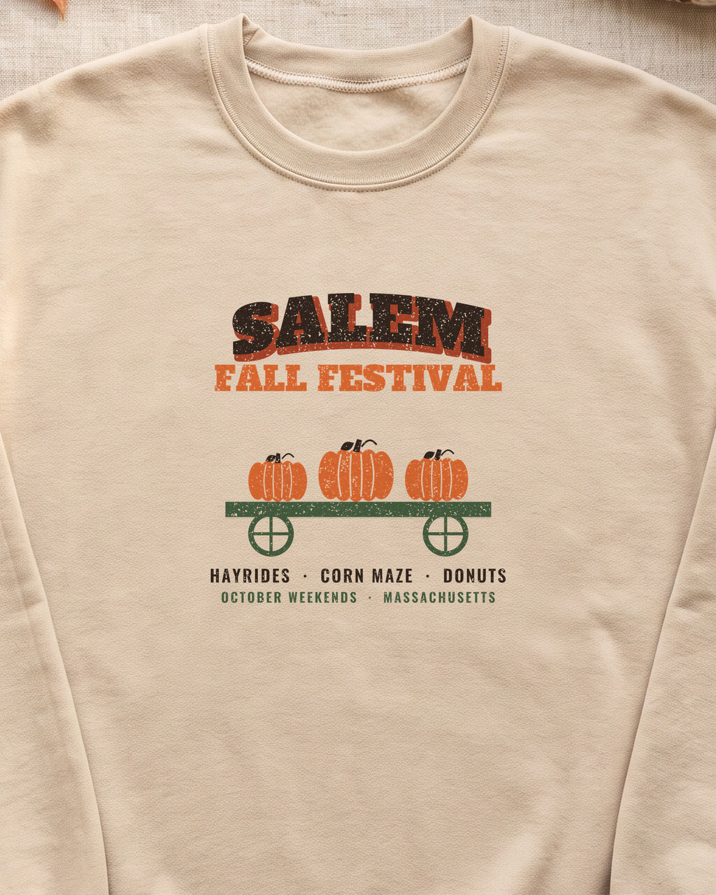 Salem Massachusetts Fall Festival Hay Wagon Crewneck Sweatshirt (close-up)