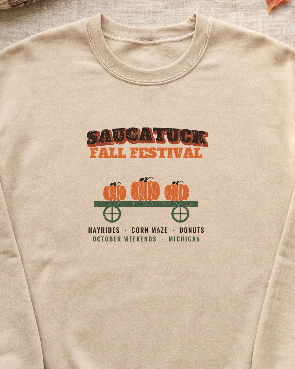 Saugatuck Michigan Fall Festival Hay Wagon Crewneck Sweatshirt (close-up)