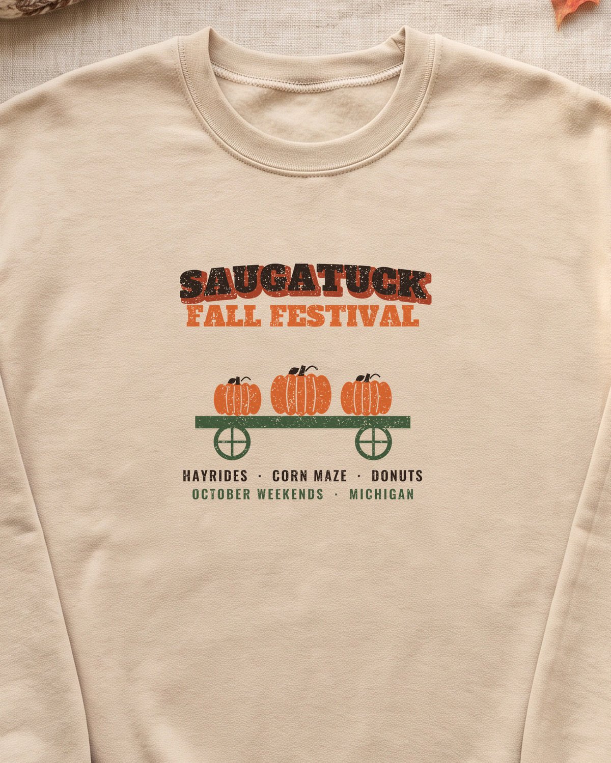 Saugatuck Michigan Fall Festival Hay Wagon Crewneck Sweatshirt (close-up)