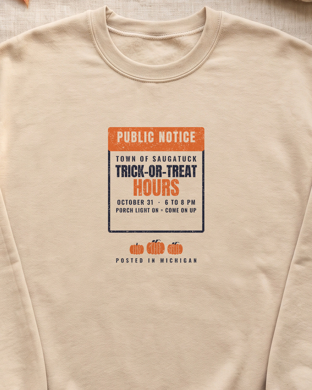 Saugatuck Michigan Trick-or-Treat Hours Notice Crewneck Sweatshirt (close-up)