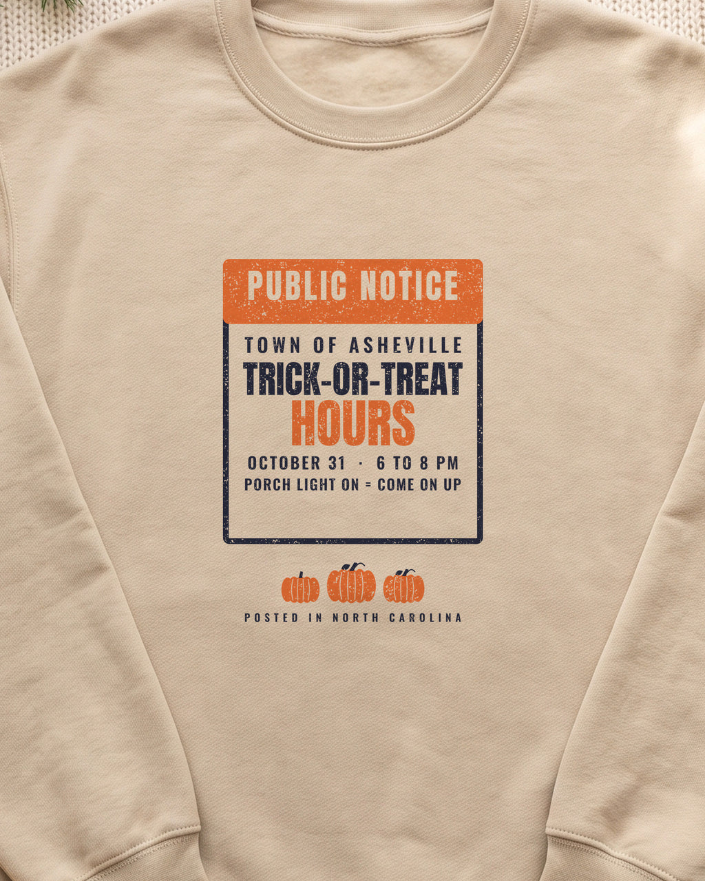 Asheville North Carolina Trick-or-Treat Hours Notice Crewneck Sweatshirt (close-up)