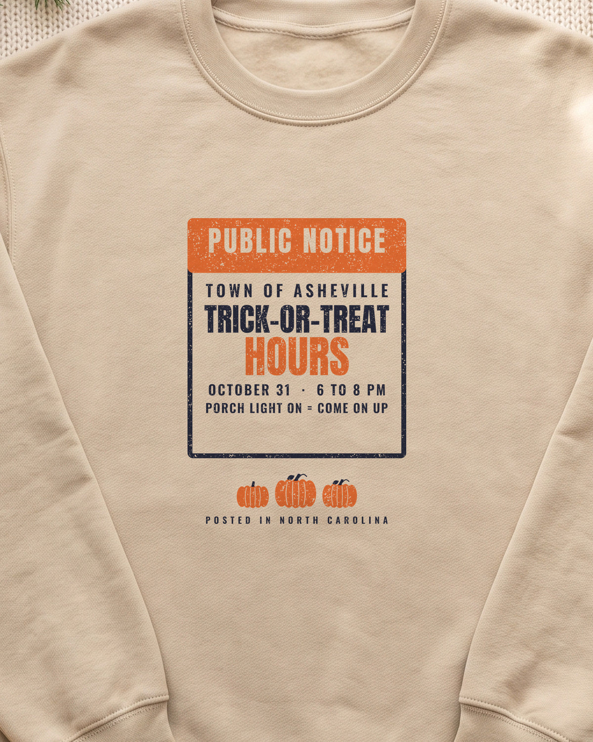 Asheville North Carolina Trick-or-Treat Hours Notice Crewneck Sweatshirt (close-up)