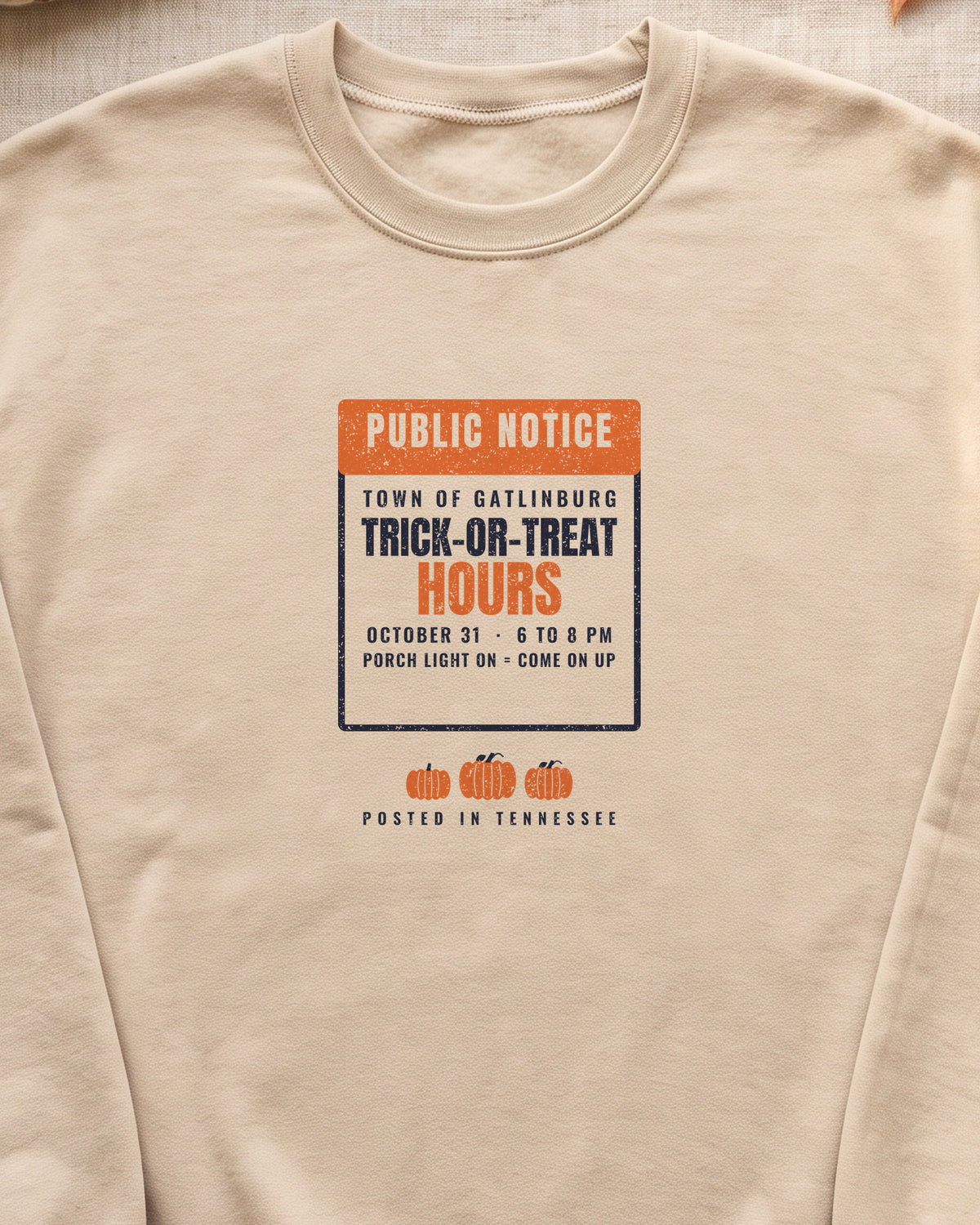 Gatlinburg Tennessee Trick-or-Treat Hours Notice Crewneck Sweatshirt (close-up)