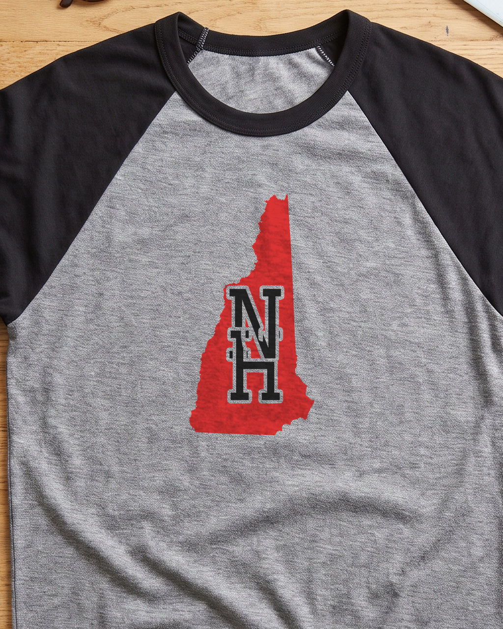 New Hampshire Varsity Monogram Map Raglan 3/4 Sleeve Tee (close-up)