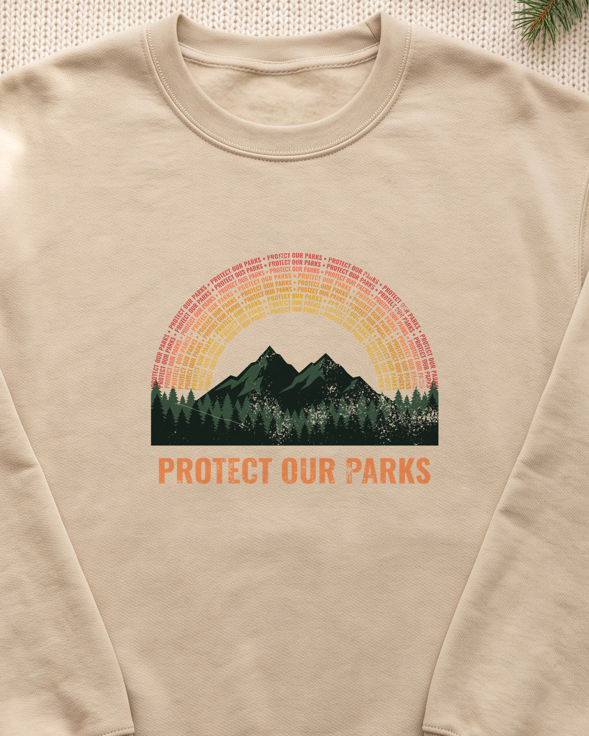 Protect Our Parks Retro Sunset Mountains Crewneck Sweatshirt (close-up)