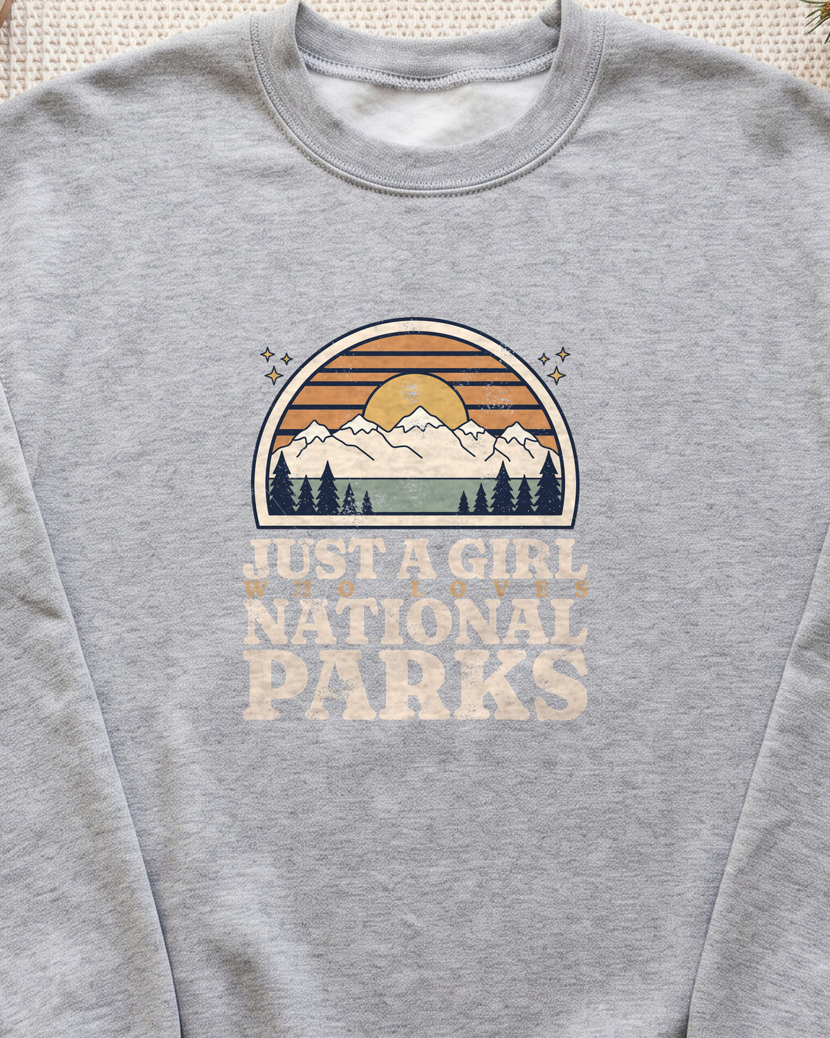 Just a Girl Who Loves National Parks Retro Sunset Crewneck Sweatshirt (close-up)