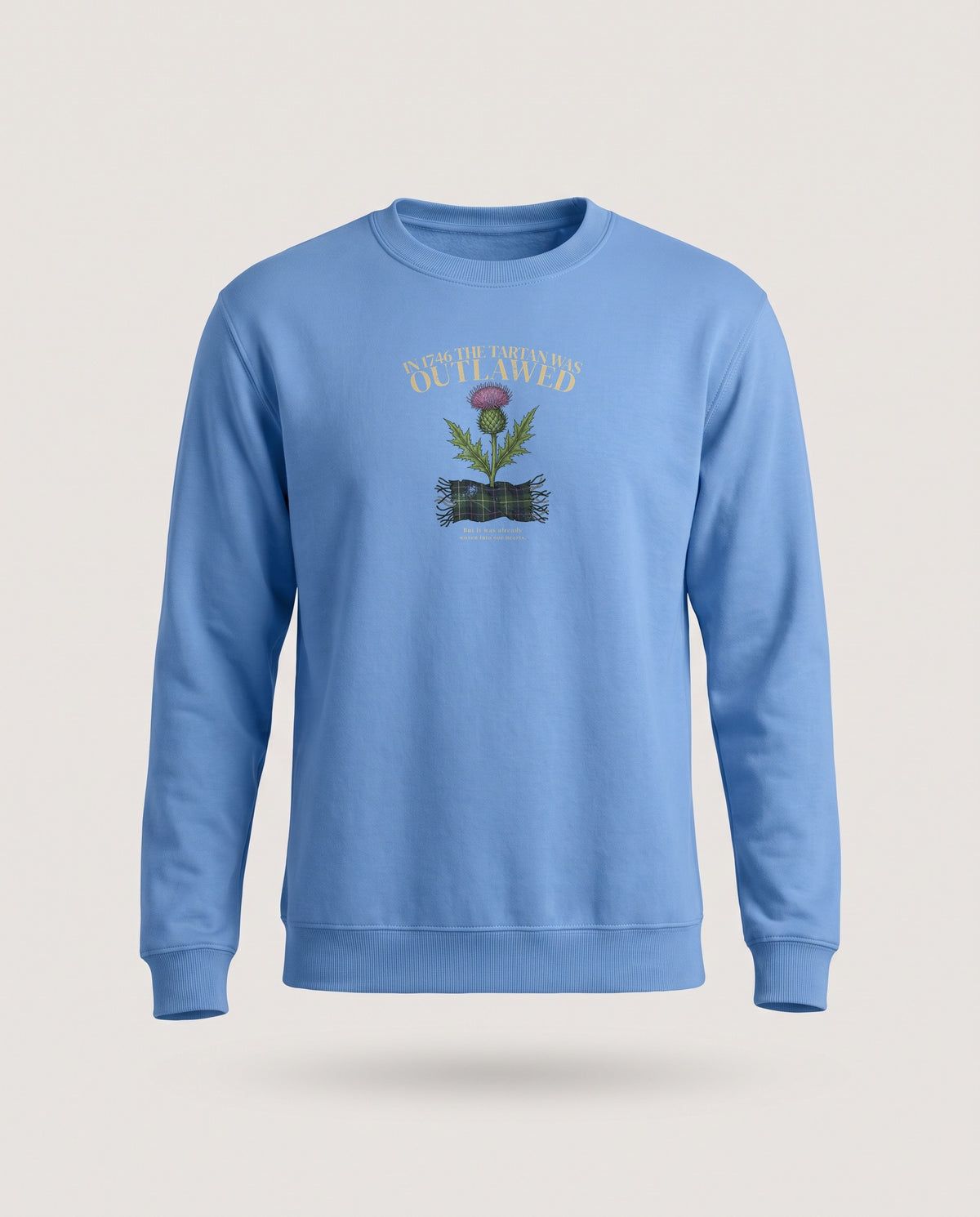 In 1746 the Tartan Was Outlawed Scottish Thistle Crewneck Sweatshirt — Carolina Blue (mockup)