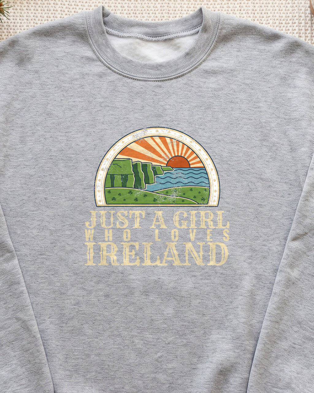 Just a Girl Who Loves Ireland Sea Cliffs Sunburst Crewneck Sweatshirt (close-up)